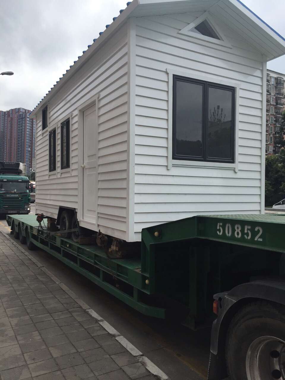 江門(mén)到香港物流專線，江門(mén)到香港移動(dòng)房車(chē)運(yùn)輸案例